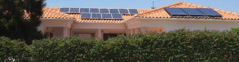 Bom Sucesso front view hedge and solar panels